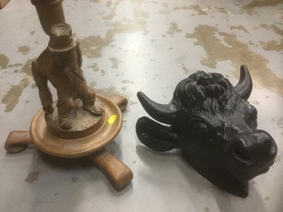 Lot 296 - Carved wooden lamp, together with a carved bulls head