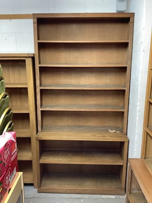 Lot 1071 - Pair of oak two height open bookcases