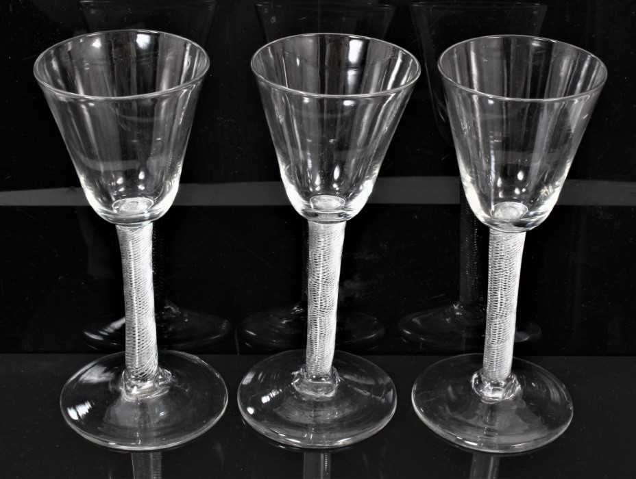 Lot 193 - Three large wine glasses, each with air twist stem, circa 1760