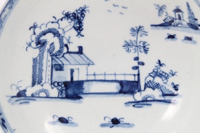 Lot 116 - Lowestoft blue and white tea bowl and saucer, circa 1780