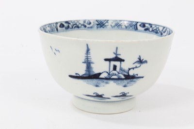 Lot 116 - Lowestoft blue and white tea bowl and saucer, circa 1780