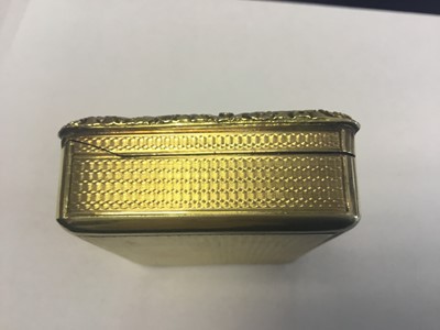 Lot 1 - Fine Georgian silver gilt presentation table snuff box of retangular form with romantic cartouche to lid decorated with huntsman and female admirer with hound and putti, engine turned ground with f...
