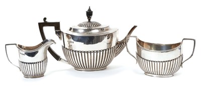 Lot 400 - Edwardian silver three piece teaset