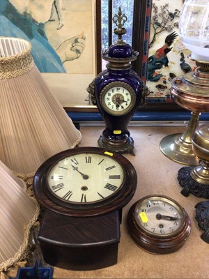 Lot 215 - Late 19th century timepiece in blue ceramic urn shape case