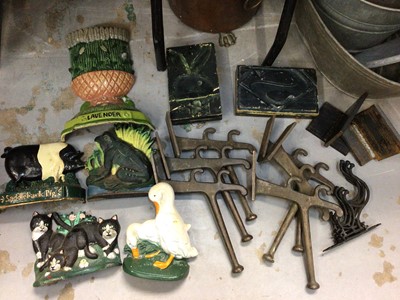 Lot 437 - Painted cast metal door stops, brackets and other metalware