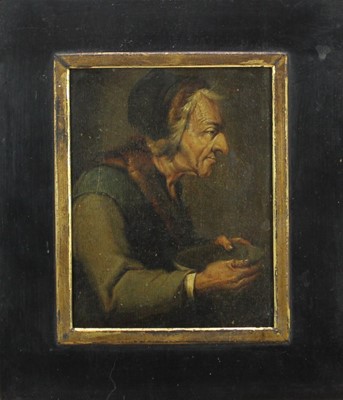 Lot 1052 - Attributed to Adriaen Van Ostade (1610 - 1685) oil on panel- beggar proffering his begging bowl, in  
black and gilt frame. 13 x 10cm.