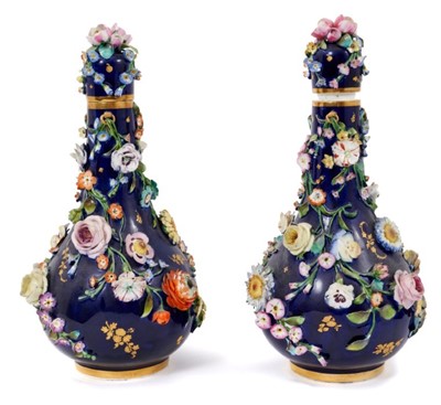 Lot 199 - Pair of 19th century floral encrusted vases and covers