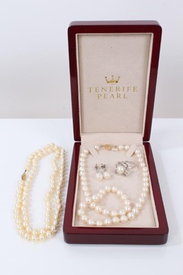 Lot 692 - Two cultured pearl necklaces, pair of cultured pearl earrings and a cultured pearl silver dress ring