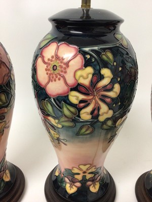 Lot 1104 - Set of three modern Moorcroft lamps