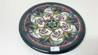 Lot 1105 - Two large Moorcroft dishes together with pin tray and small vase