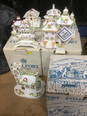 Lot 202 - Seven various Coalport cottages, some boxed