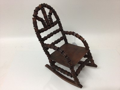Lot 1811 - Unusual late 19th century American doll’s rocking chair made from cotton reels