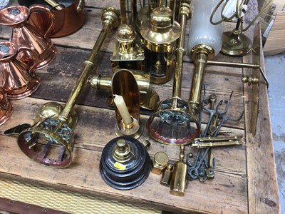 Lot 28 - Good collection of copper and brassware, including graduated jugs, oil lamps, etc