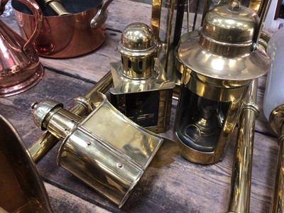 Lot 28 - Good collection of copper and brassware, including graduated jugs, oil lamps, etc