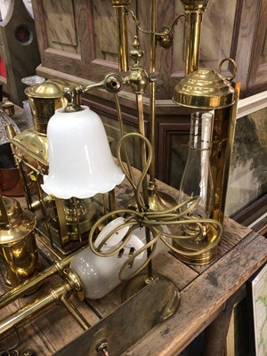 Lot 28 - Good collection of copper and brassware, including graduated jugs, oil lamps, etc