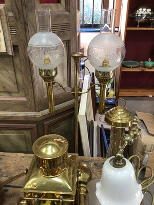 Lot 28 - Good collection of copper and brassware, including graduated jugs, oil lamps, etc