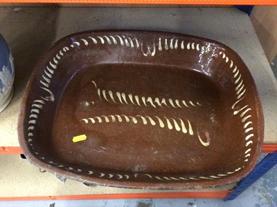 Lot 57 - Victorian slip ware baking dish with a Victorian relief moulded jug