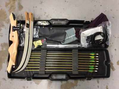 Lot 67 - Cased archery set with bow, arrows and accessories