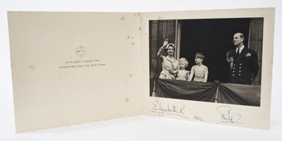 Lot 67 - H.M Queen Elizabeth II and H.R.H. The Duke of Edinburgh, signed 1954 Christmas card with gilt crown to cover, photograph of the Royal couple and their young children waving from the balcony of Buck...