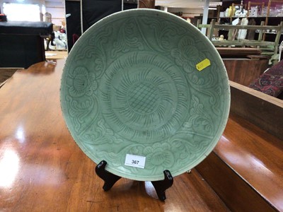 Lot 367 - 19th century Chinese celadon dish, together with a large Indian embroidery