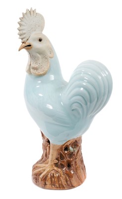 Lot 100 - Large Chinese celadon glazed model of a cockerel, with biscuit glazed face and crest, 19th/20th century, measuring 38.5cm high