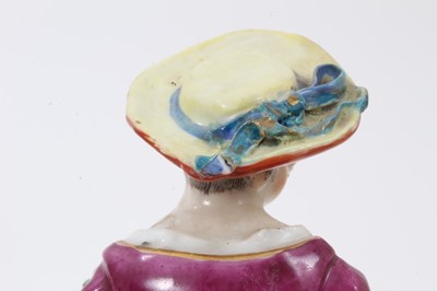 Lot 33 - A pair of Continental porcelain figures, in 18th century style