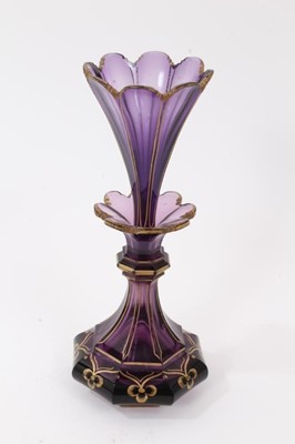 Lot 272 - A Victorian amethyst tinted glass scent bottle and stopper