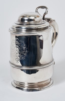 Lot 445 - George II silver-lidded tankard of bellied form with applied reeded girdle and scroll handle