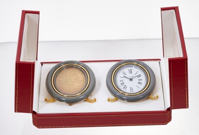 Lot 561 - Cartier Les Must de Cartier desk clock and matching photograph frame in fitted box
