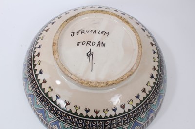 Lot 134 - Middle Eastern bowl, decorated with animals under a tree, patterned ground, 36cm diameter