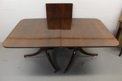 Lot 1392 - George III style mahogany twin pedestal dining table