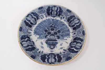 Lot 244 - 18th century Dutch blue and white delftware dish, decorated with the peacock pattern, with yellow-painted rim, marked to base, possibly for De Porceleyne Claeuw, 34.5cm diameter