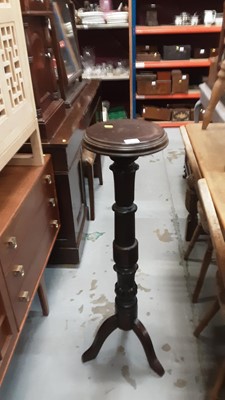 Lot 1111 - Mahogany torchère and a writing slope