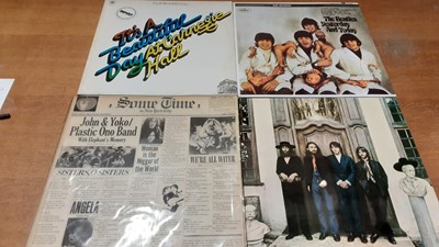 Lot 2315 - Two vintage cases of LP records including Rolling Stones, Beatles, John Lennon, Led Zeppelin, Jefferson Airplane, Zappa, Buddy Holly and Spencer Davis, most discs in very good or excellent conditio...