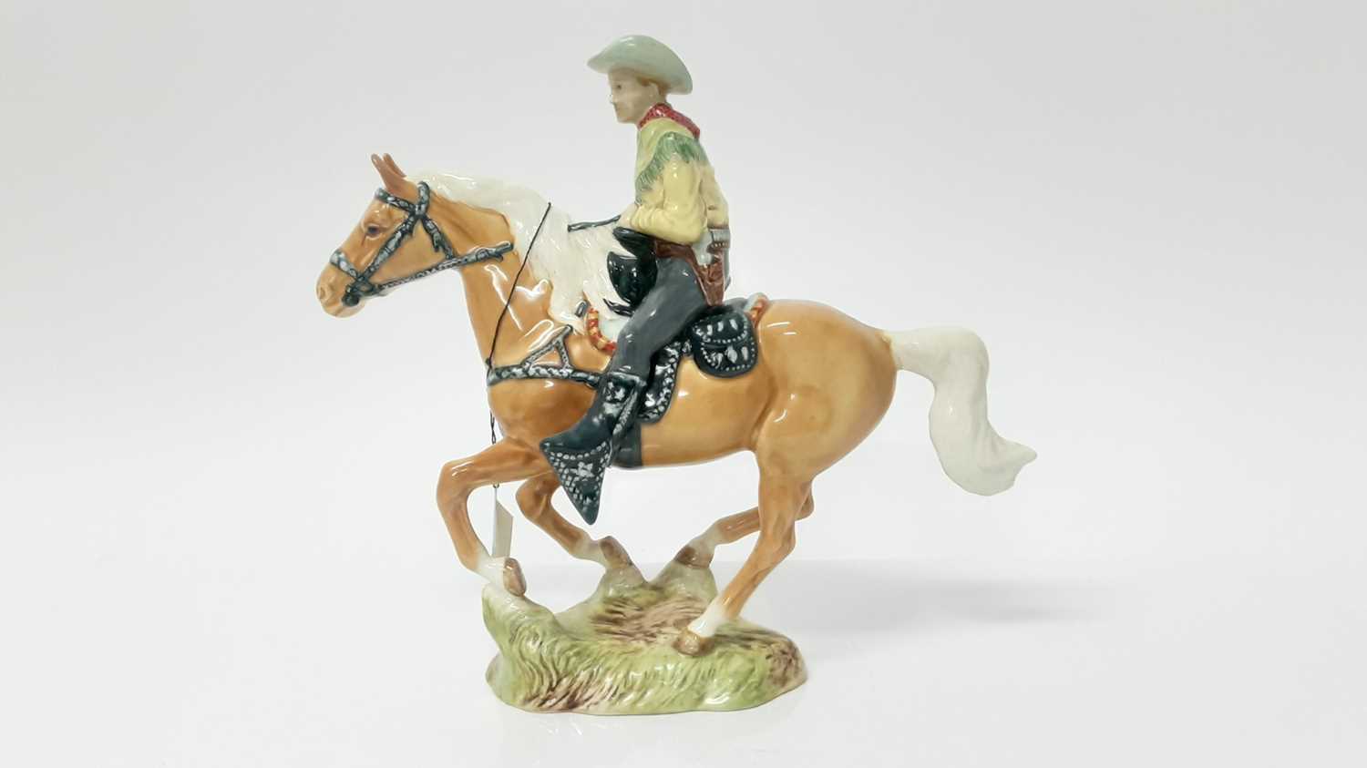 Lot 3 - Beswick Canadian mounted Cowboy , model no. 1377, designed by Graham Orwell, 22.2cm in height