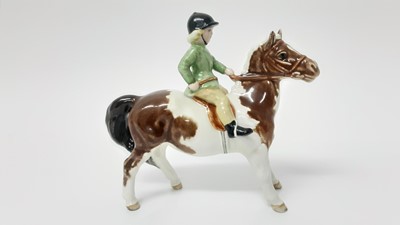 Lot 14 - Beswick Girl on Pony, model no. 1499, designed by Arthur Gredington, 14cm in height