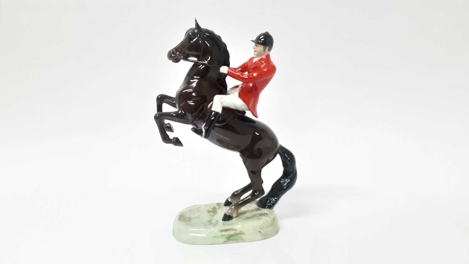 Lot 19 - Beswick Huntsman (on rearing horse), style 1, colourway 1 rider, designed by Arthur Gredington, 25.4cm in height