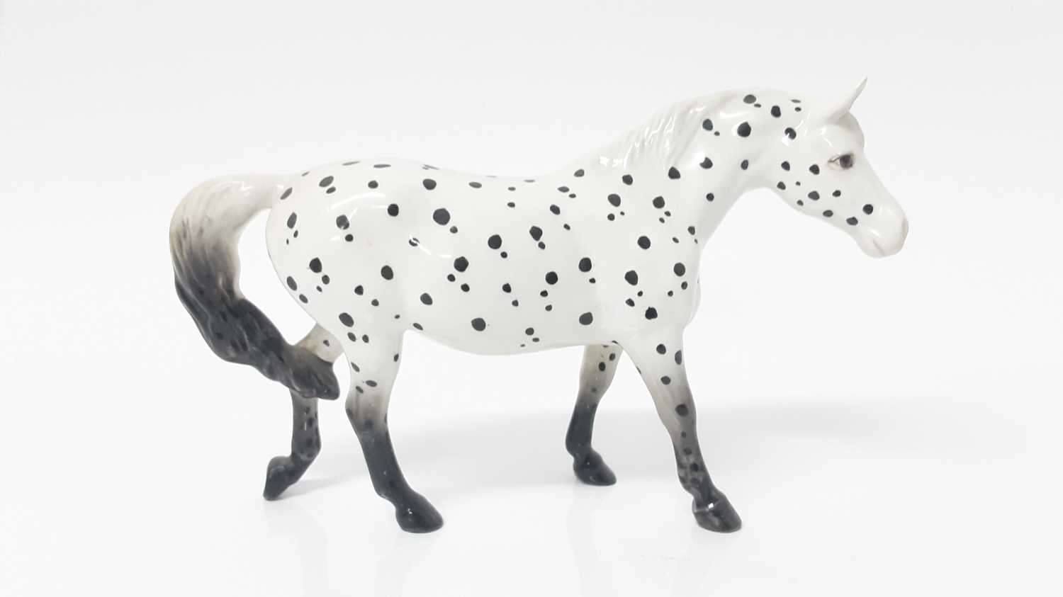 Lot 46 - Beswick Appaloosa (spotted walking pony), model no. 1516, designed by Arthur Gredington, 13.5cm high