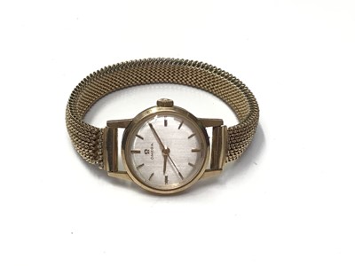Lot 48 - Ladies Omega 9ct gold cased wristwatch on gold plated expandable bracelet