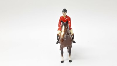 Lot 71 - Beswick Huntsman (style two) model no. 1501, designed by Arthur Gredington, 21cm, together with three hounds and a fox (5)
