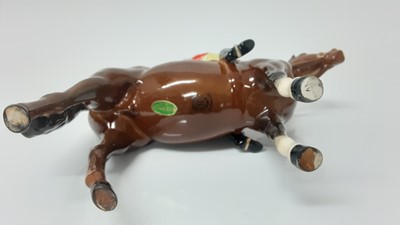Lot 71 - Beswick Huntsman (style two) model no. 1501, designed by Arthur Gredington, 21cm, together with three hounds and a fox (5)