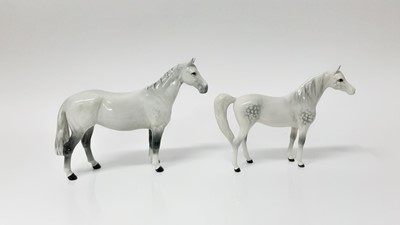 Lot 73 - Beswick Arab "Xayal" model no. 1265, designed by Arthur Gredington, 16cm high, together with another horse (2)