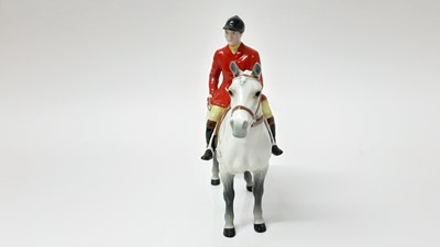 Lot 74 - Beswick Huntsman (style two) model no. 1501, designed by Arthur Gredington, 21cm high, together with two hounds and two foxes (5)