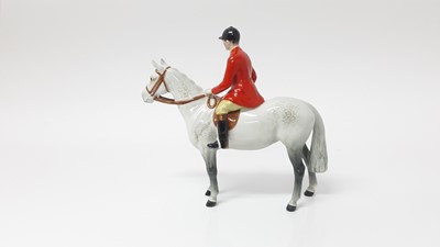 Lot 74 - Beswick Huntsman (style two) model no. 1501, designed by Arthur Gredington, 21cm high, together with two hounds and two foxes (5)