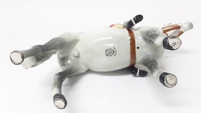 Lot 74 - Beswick Huntsman (style two) model no. 1501, designed by Arthur Gredington, 21cm high, together with two hounds and two foxes (5)