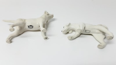 Lot 74 - Beswick Huntsman (style two) model no. 1501, designed by Arthur Gredington, 21cm high, together with two hounds and two foxes (5)