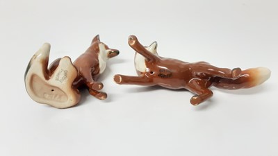 Lot 74 - Beswick Huntsman (style two) model no. 1501, designed by Arthur Gredington, 21cm high, together with two hounds and two foxes (5)