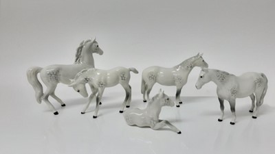 Lot 76 - Five various Beswick horses including Foal (lying) model no. 915, designed by Arthur Gredington, 8cm high