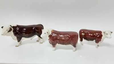 Lot 92 - Two Beswick Hereford Bulls - CH of Champions and another similar (3)