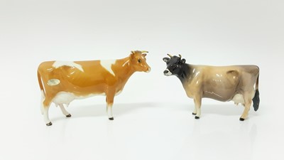 Lot 93 - Beswick Jersey Cow - CH Newton Tinkle, model no. 1345, designed by Arthur Gredington, 10.8cm high, together with Guernsey Cow, and Bull plus a Limousin calf(4)